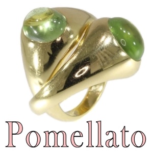Original intertwined gold Pomellato rings with green garnets - demantoid